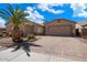Spacious driveway leading to a well-maintained home with a tandem garage, offering ample parking at 43261 W Neely Dr, Maricopa, AZ 85138
