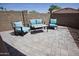 Backyard featuring a covered patio and an outdoor seating area at 5013 E Shomi St, Phoenix, AZ 85044