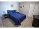 Guest bedroom featuring a spacious closet and room for a queen sized bed at 5013 E Shomi St, Phoenix, AZ 85044