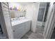 Convenient laundry room with modern appliances and a view into the attached bathroom at 5013 E Shomi St, Phoenix, AZ 85044