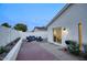 A cozy backyard patio with a grill, perfect for outdoor dining and entertaining at 614 W Kings Ave, Phoenix, AZ 85023