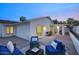 Charming backyard patio with ample seating, ideal for relaxation and outdoor gatherings at 614 W Kings Ave, Phoenix, AZ 85023