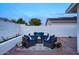 Backyard patio featuring stylish outdoor seating, perfect for relaxation and entertainment at 614 W Kings Ave, Phoenix, AZ 85023