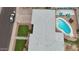 Aerial view of backyard, pool, and neighborhood, showcasing the property's surroundings and features at 6207 W Orange Dr, Glendale, AZ 85301