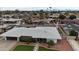 Aerial view of a single-Gathering home with well-maintained front yard and mature trees at 6207 W Orange Dr, Glendale, AZ 85301