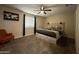 Cozy bedroom with a comfortable bed, stylish decor, and ample natural light, creating a relaxing retreat at 6207 W Orange Dr, Glendale, AZ 85301