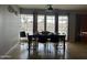 Sunny dining area featuring a large table and plenty of natural light at 6207 W Orange Dr, Glendale, AZ 85301