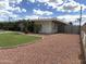 Charming home with beautiful landscaping and a gated yard at 6207 W Orange Dr, Glendale, AZ 85301