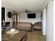 Comfortable living room showcasing tile floors and a large comfortable sofa at 6207 W Orange Dr, Glendale, AZ 85301