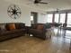 Inviting living room featuring tile floors and a comfortable sofa at 6207 W Orange Dr, Glendale, AZ 85301