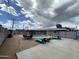 Inviting backyard featuring a pool, patio furniture, and fenced yard at 6207 W Orange Dr, Glendale, AZ 85301