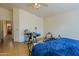 Bright, spacious bedroom featuring tile floors, ample natural light, and versatile layout possibilities at 7915 N 53Rd Dr, Glendale, AZ 85301