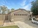 Charming single-story home featuring a two-car garage, gated entry, and well-maintained landscaping at 7915 N 53Rd Dr, Glendale, AZ 85301