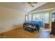 Bright, spacious primary bedroom featuring tile floors, a large window, and ample natural light at 7915 N 53Rd Dr, Glendale, AZ 85301