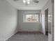 Cozy bedroom features a ceiling fan and a window allowing for ample natural light at 860 N Mcqueen Rd # 1184, Chandler, AZ 85225