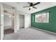 Inviting bedroom features a window, ceiling fan, and closet for great flow at 860 N Mcqueen Rd # 1184, Chandler, AZ 85225