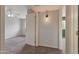 A secondary bedroom with carpet and views to an adjacent room at 860 N Mcqueen Rd # 1184, Chandler, AZ 85225