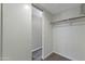 Bright walk-in closet featuring a neutral color scheme and functional storage solutions at 860 N Mcqueen Rd # 1184, Chandler, AZ 85225