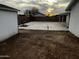 Large backyard with a vast concrete area, offering versatile space for various outdoor activities and possibilities at 8719 W Monterey Way, Phoenix, AZ 85037