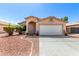Charming single-story home featuring a well-maintained front yard and attached two-car garage at 8741 W Manzanita Dr, Peoria, AZ 85345