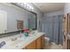 Bathroom featuring double sinks, a large mirror, and ample space for personal care items at 9443 E Mallory St, Mesa, AZ 85207