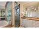 Luxurious bathroom featuring a glass shower, marble accents, and a soaking tub for a relaxing retreat at 9643 E Legacy Ridge Rd, Scottsdale, AZ 85262