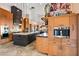 Spacious kitchen with custom wood cabinets, stainless steel appliances, and multiple islands at 9643 E Legacy Ridge Rd, Scottsdale, AZ 85262
