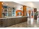 Stylish wet bar featuring a unique design, plenty of counter space, and ample storage at 9643 E Legacy Ridge Rd, Scottsdale, AZ 85262