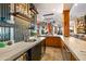 Well-equipped wet bar with stylish backsplash, modern sink, and open layout for entertaining at 9643 E Legacy Ridge Rd, Scottsdale, AZ 85262