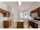 Kitchen with center island and light countertops at 9733 W Purdue Ave, Peoria, AZ 85345