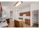 Classic kitchen featuring wooden cabinets, white countertops and island, perfect for culinary enthusiasts at 9733 W Purdue Ave, Peoria, AZ 85345