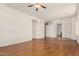 Spacious living room featuring hardwood floors, recessed lights, and open floorplan at 9733 W Purdue Ave, Peoria, AZ 85345