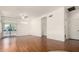 Bright living room featuring hardwood floors, recessed lights, and lots of natural light at 9733 W Purdue Ave, Peoria, AZ 85345