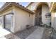 Inviting covered front porch with chairs, offering a relaxing outdoor space at 9954 W Mohawk Ln, Peoria, AZ 85382