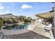 Inviting backyard showcasing the refreshing pool, patio, and serene privacy at 9954 W Mohawk Ln, Peoria, AZ 85382