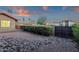 Low-maintenance backyard with rock landscaping, providing a tranquil and desert-friendly outdoor space at 10484 E Mission Ln, Scottsdale, AZ 85258