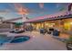 Lush backyard featuring a refreshing pool and spa, perfect for relaxation and entertainment at 10484 E Mission Ln, Scottsdale, AZ 85258