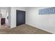 Cozy bedroom featuring neutral carpet, ample closet space, and simple decor for a comfortable retreat at 10484 E Mission Ln, Scottsdale, AZ 85258