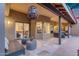 Spacious covered patio with comfortable seating, creating an inviting outdoor living space at 10484 E Mission Ln, Scottsdale, AZ 85258