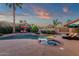 Beautiful backyard pool and spa surrounded by lush landscaping, creating a private retreat at 10484 E Mission Ln, Scottsdale, AZ 85258