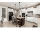 Well-equipped kitchen with modern appliances, a center island, and a convenient pantry at 1078 W Redwood Ave, Queen Creek, AZ 85140
