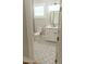Modern bathroom featuring a stylish decorative-tile floor and modern fixtures, enhancing the home's appeal at 1244 N 106Th Pl, Mesa, AZ 85207