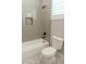 Clean bathroom features a shower-tub combo and modern fixtures, designed for comfort and efficiency at 1244 N 106Th Pl, Mesa, AZ 85207