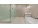 Luxurious bathroom with a glass-enclosed shower and modern fixtures, blending style with functionality at 1244 N 106Th Pl, Mesa, AZ 85207