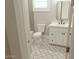 Stylist bathroom featuring a decorative-tile floor and modern fixtures, enhancing comfort and appeal at 1244 N 106Th Pl, Mesa, AZ 85207