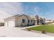 An attractive home featuring a concrete driveway, two-car garage and well-kept lawn space at 1244 N 106Th Pl, Mesa, AZ 85207