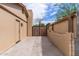 This backyard has a gate, a stucco wall and additional parking at 1403 W Wood Dr, Phoenix, AZ 85029