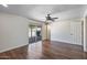 Bright bedroom with hardwood floors and sliding glass doors to the patio at 1403 W Wood Dr, Phoenix, AZ 85029