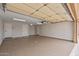 This spacious garage has an epoxy floor and multiple doors at 1403 W Wood Dr, Phoenix, AZ 85029