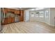 Kitchen featuring wood cabinets, stainless steel appliances, and light wood flooring at 1403 W Wood Dr, Phoenix, AZ 85029